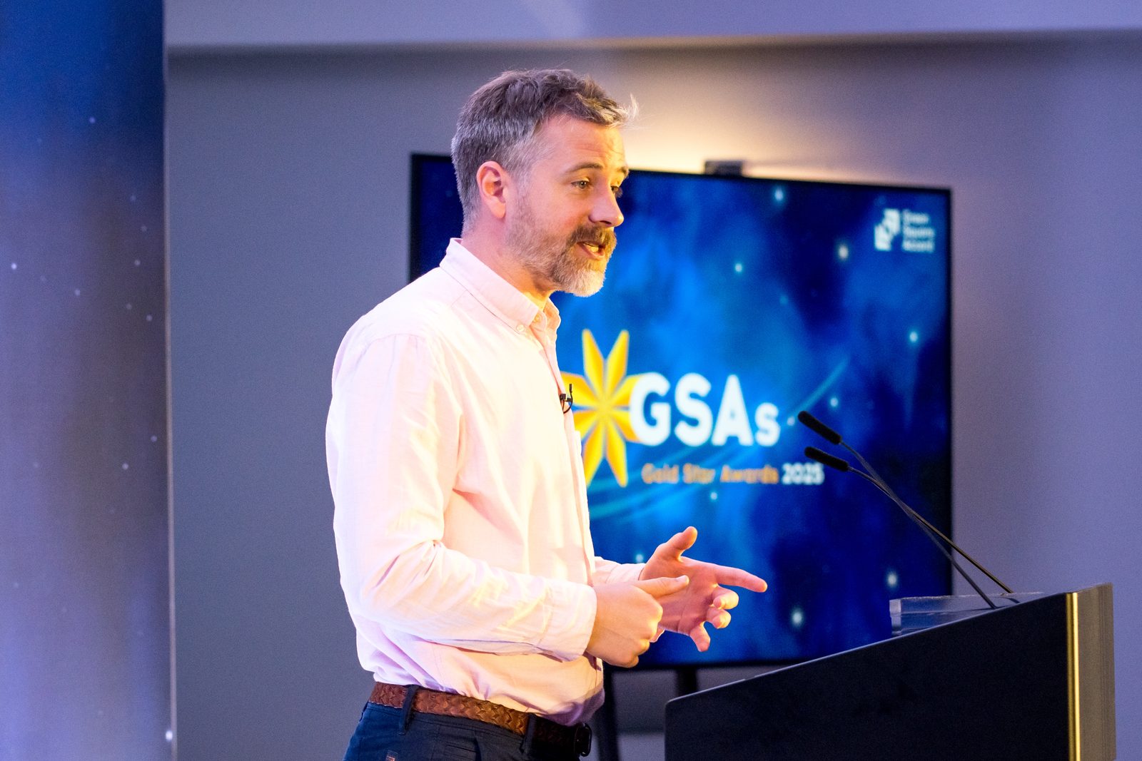 Steve Hayes presenting at an awards ceremony
